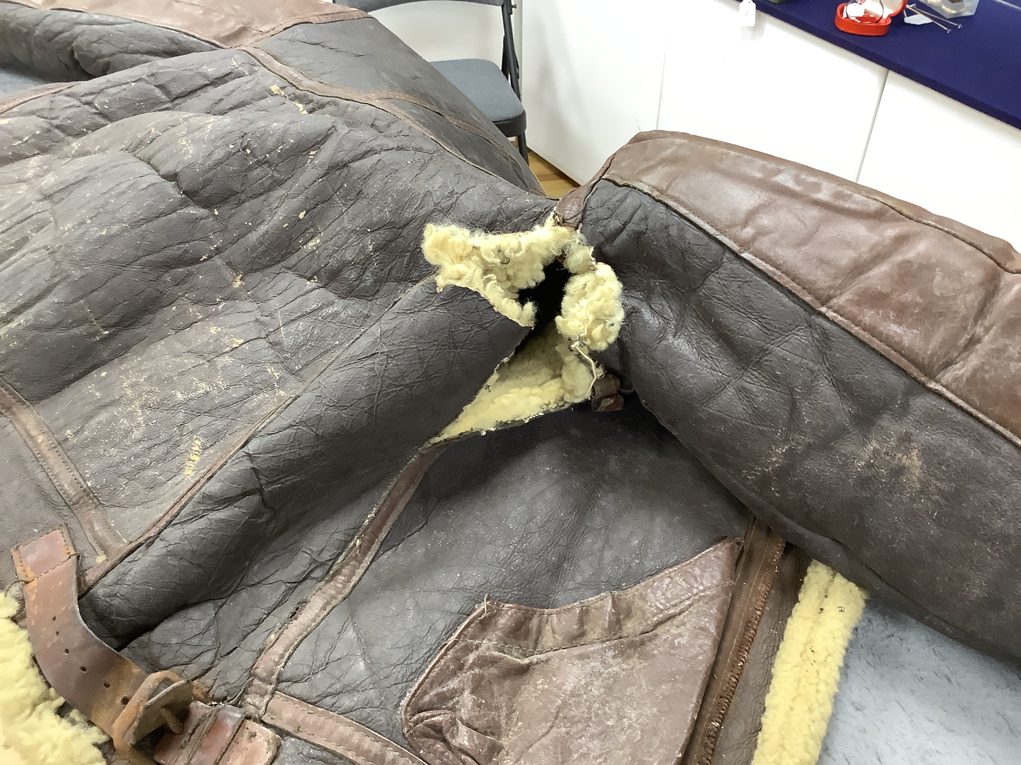 A United States Air Force Type B-3 sheepskin flying jacket, with label to collar reading; ‘Type B-3 DWG. No.33H5595 AC Order No.43-13609-AF Size 38R Property Air Force U.S. Army’